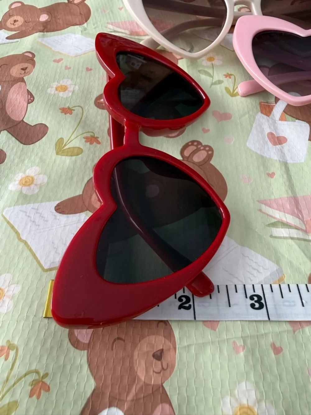 3 Pairs of Heart Shaped Plastic Sunglasses in Red, Pink and Light Tan